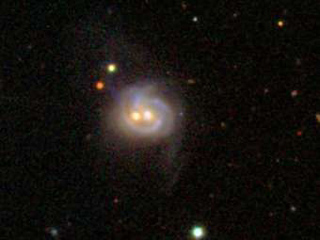 Астрономы нашли галактику, поедающую сверхмассивные черные дыры